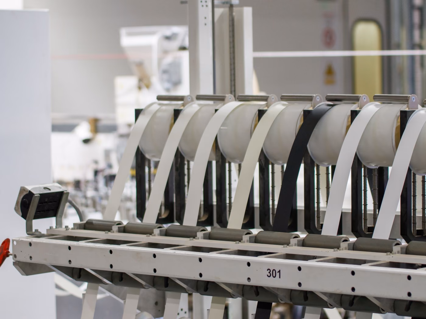 Custom lanyard and ribbon webbing on an Ortex production line